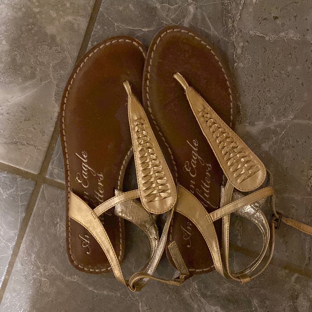 American eagle gold “gladiator” sandals with anklet straps